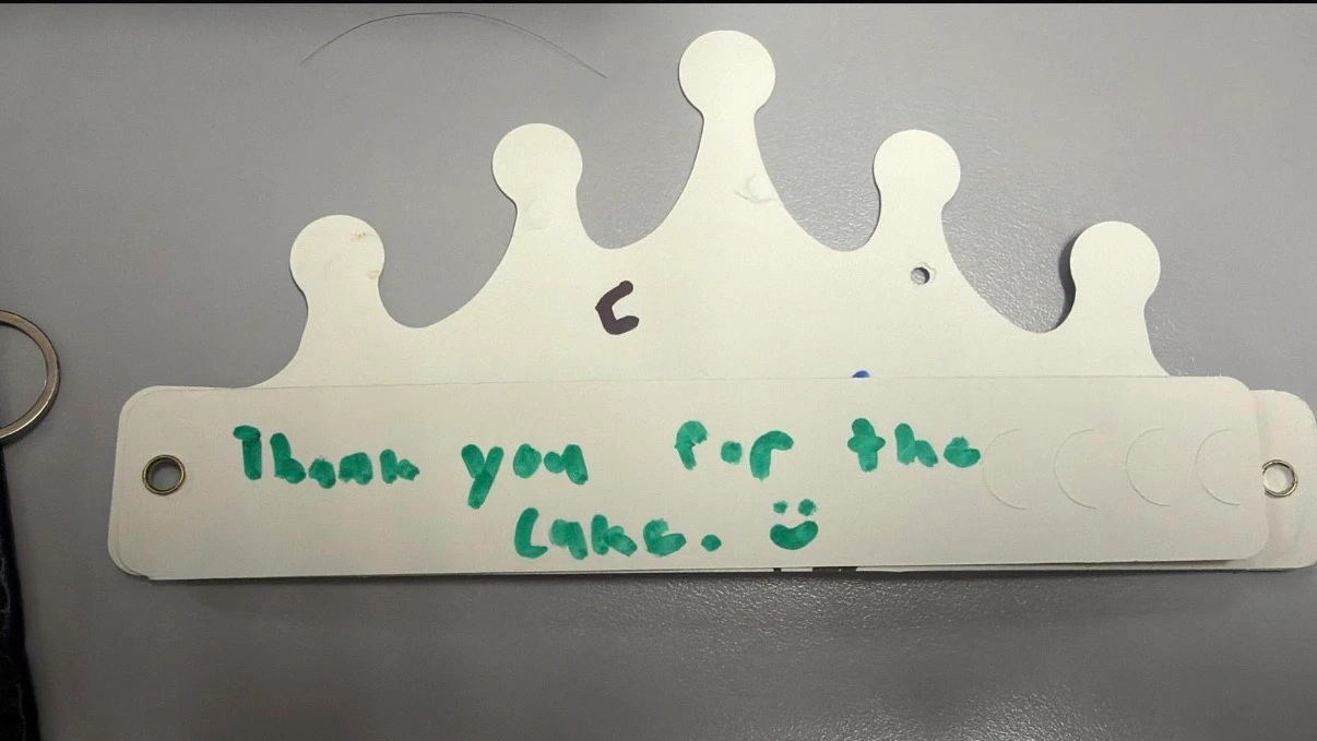 Handwritten thank-you message from a child after receiving a sponsored birthday cake