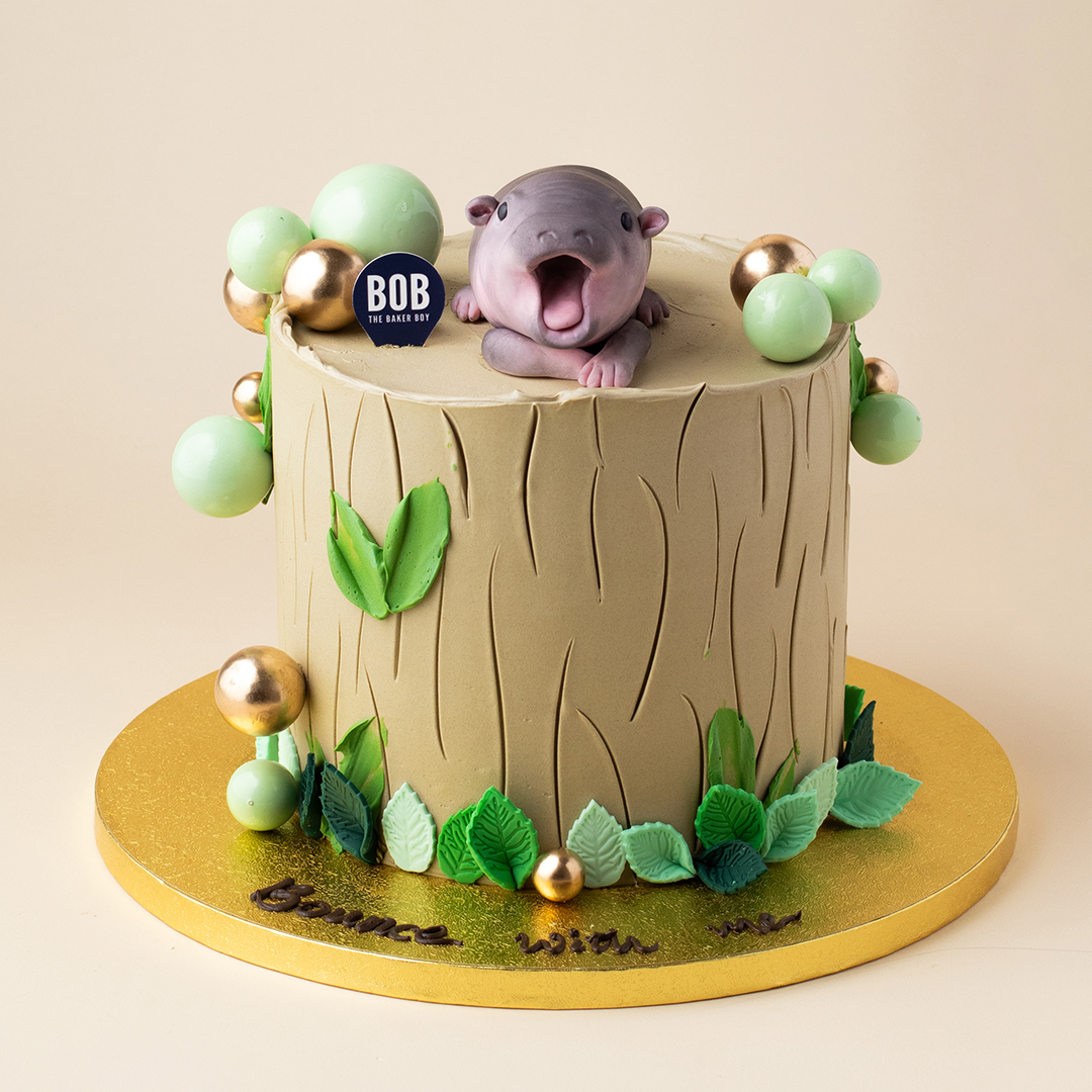 Baby Moodeng Tree Stump Cake