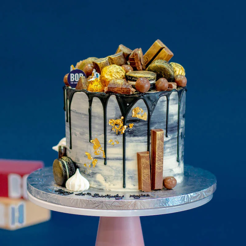 Black-White Marble Cake with Candies and Macarons