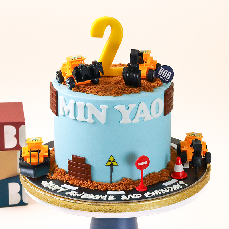 Blue Construction Excavator Cake with Bricks