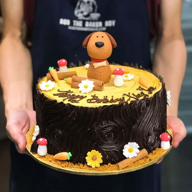 Brown Puppy Cake on Tree Stump