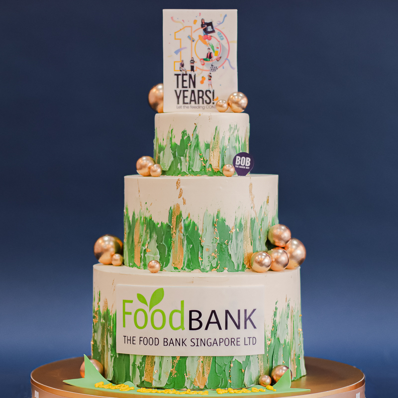Company Anniversary Cake in Green and Gold