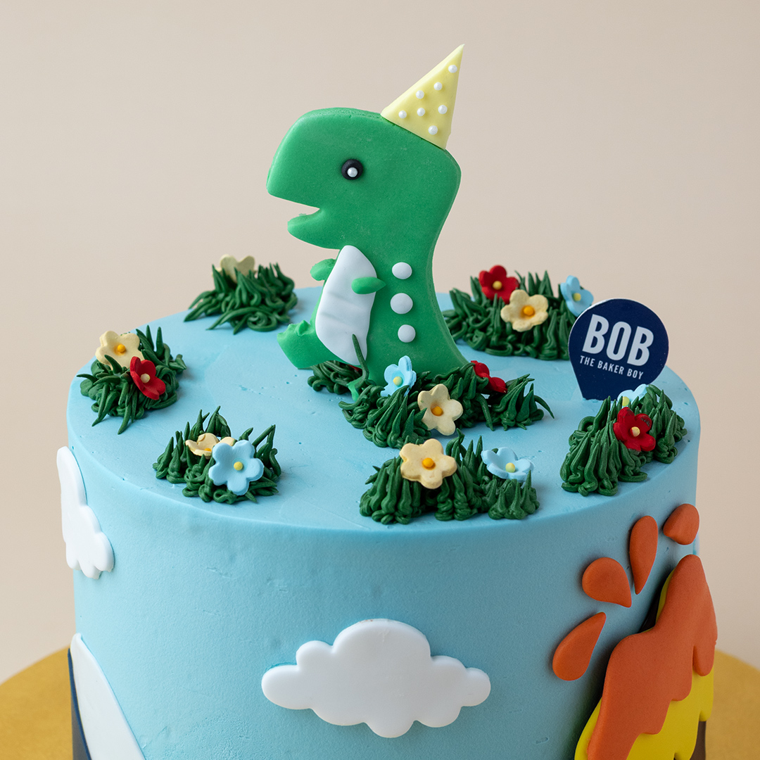 Cute Pastel T-Rex with Party Hat Dinosaur Cake