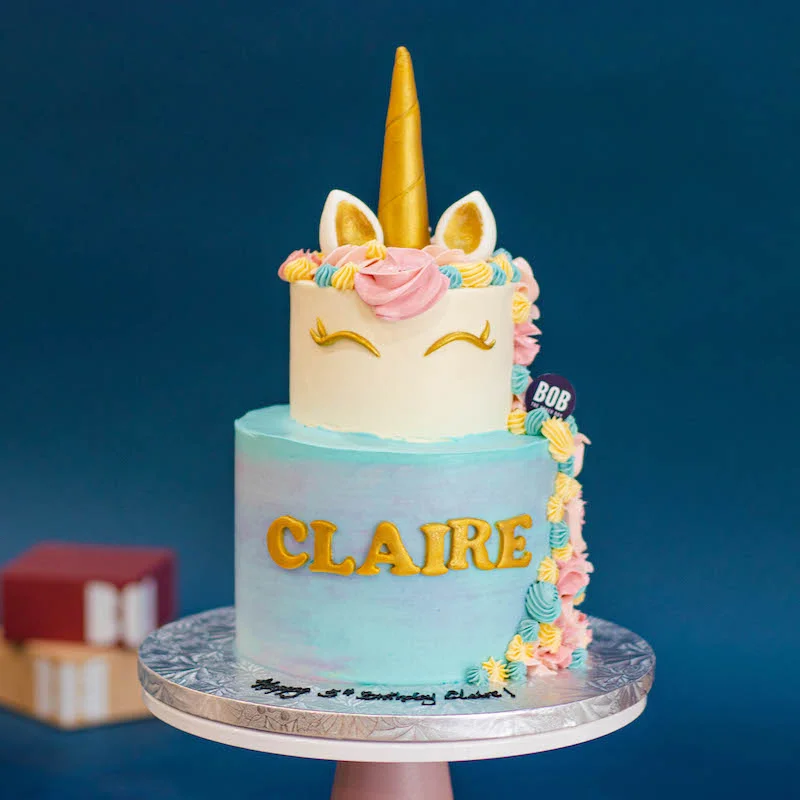 Elegant Pastel Unicorn Cake with Gold Horn