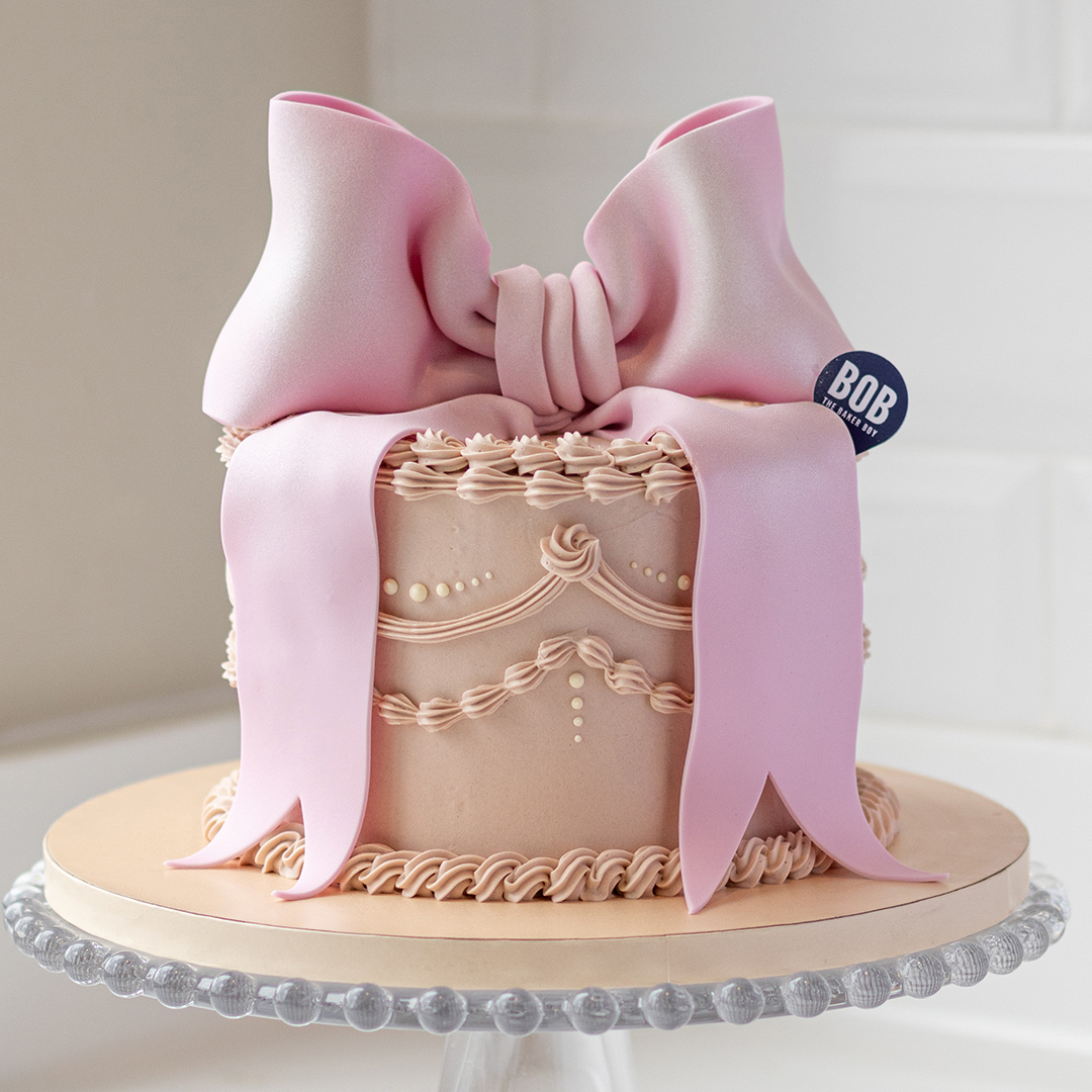 Elegant Pink Vintage Style Cake with Big Bow