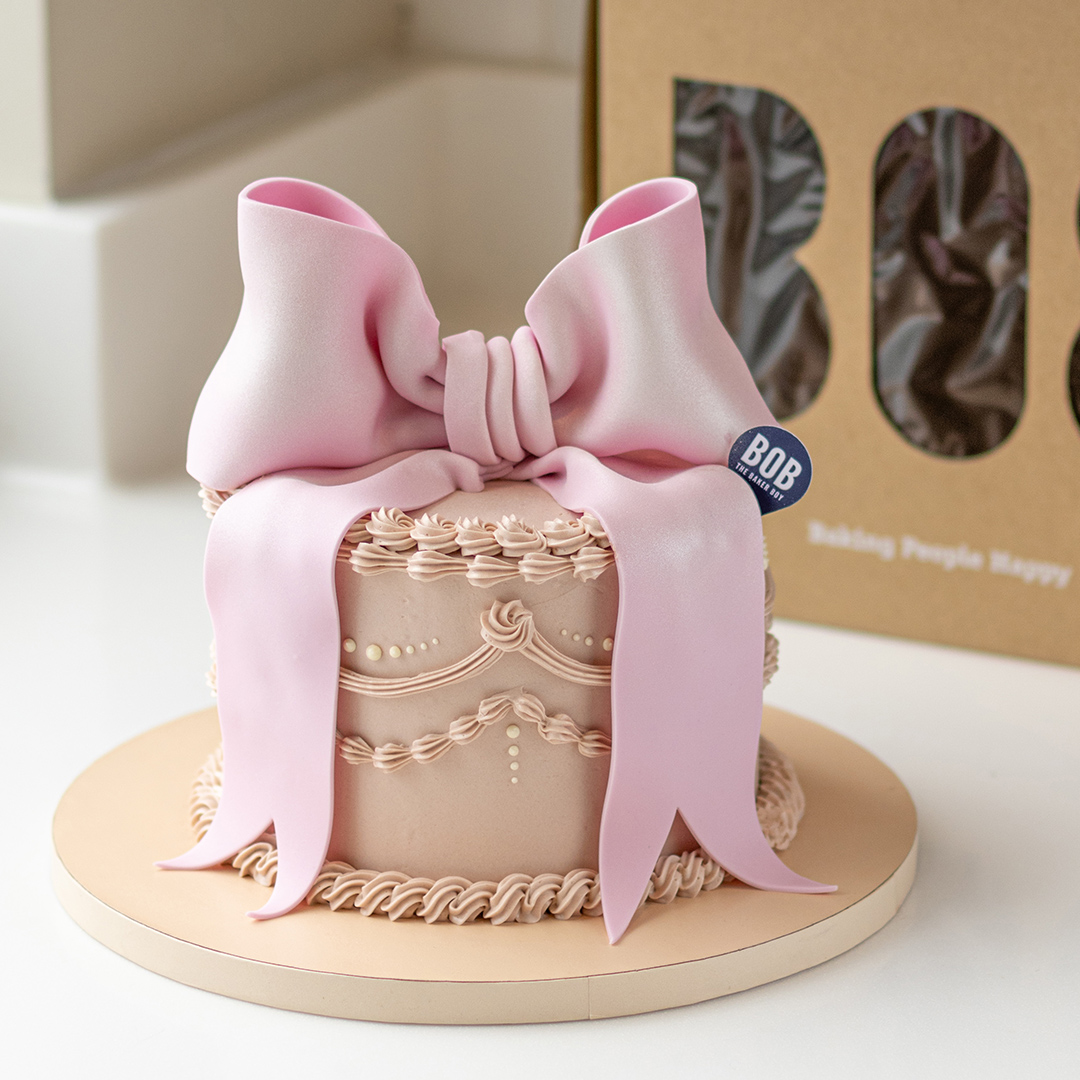 Elegant Pink Vintage Style Cake with Big Bow
