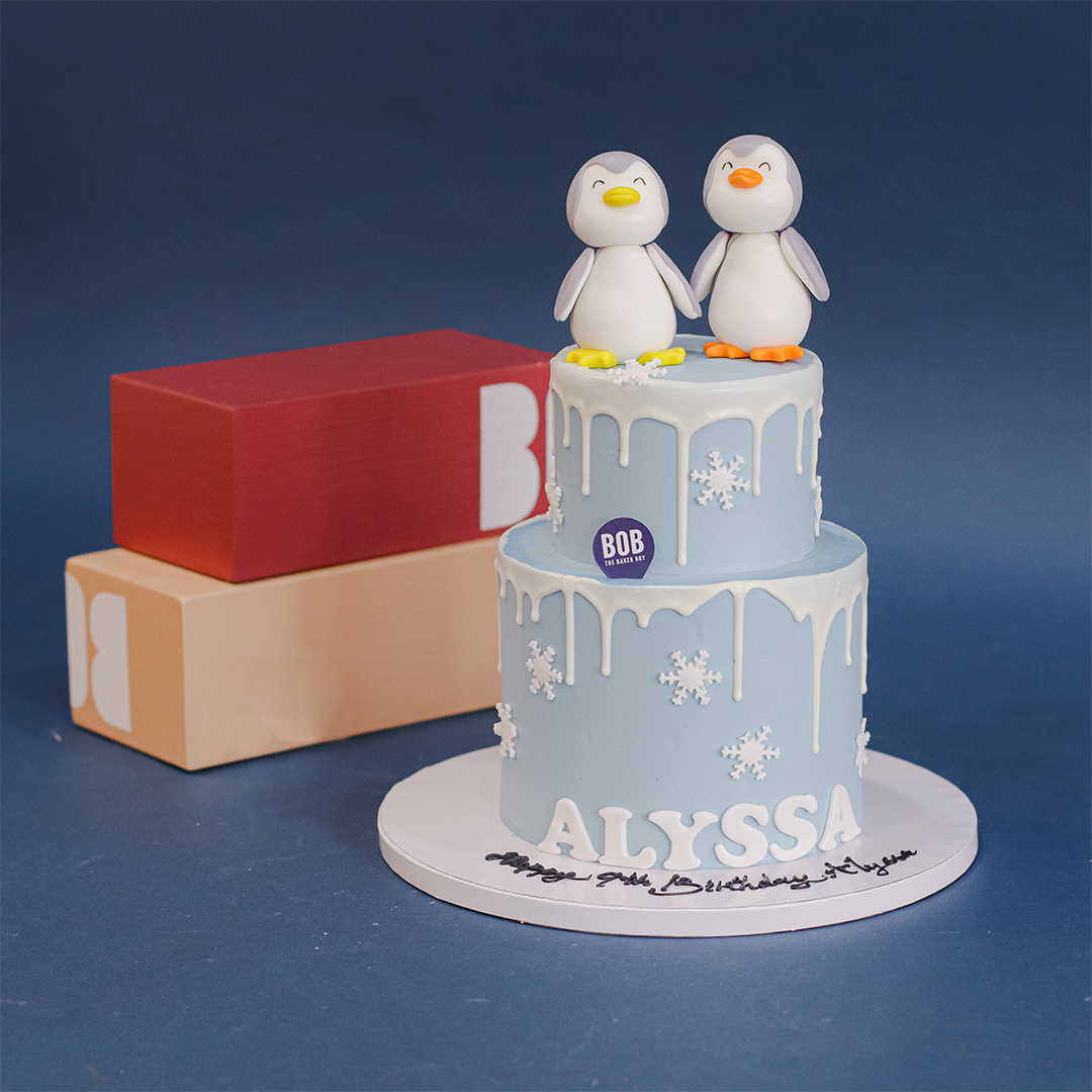 Frosty Twin Penguins Cake with Snowflakes