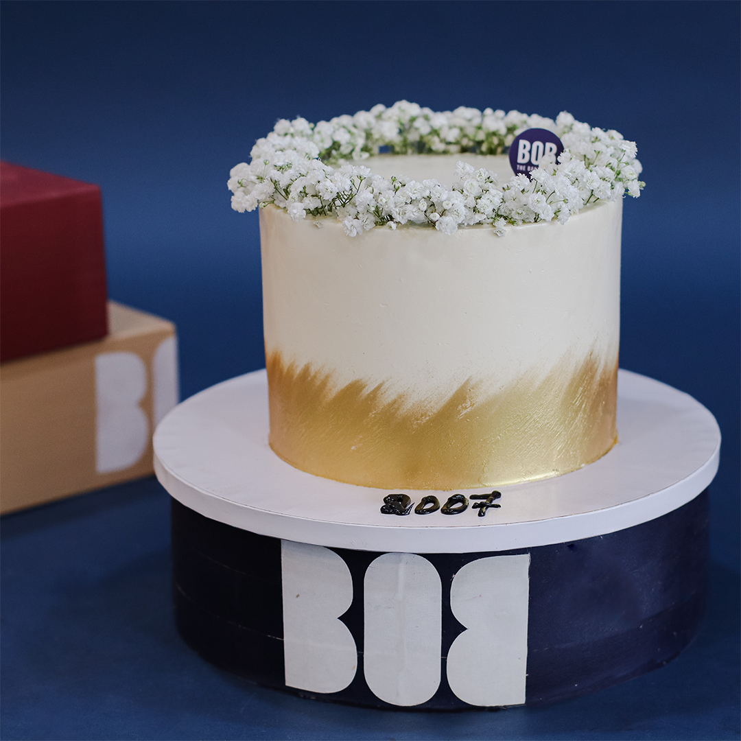 Gold Accent Cake with Babies Breath Wreath