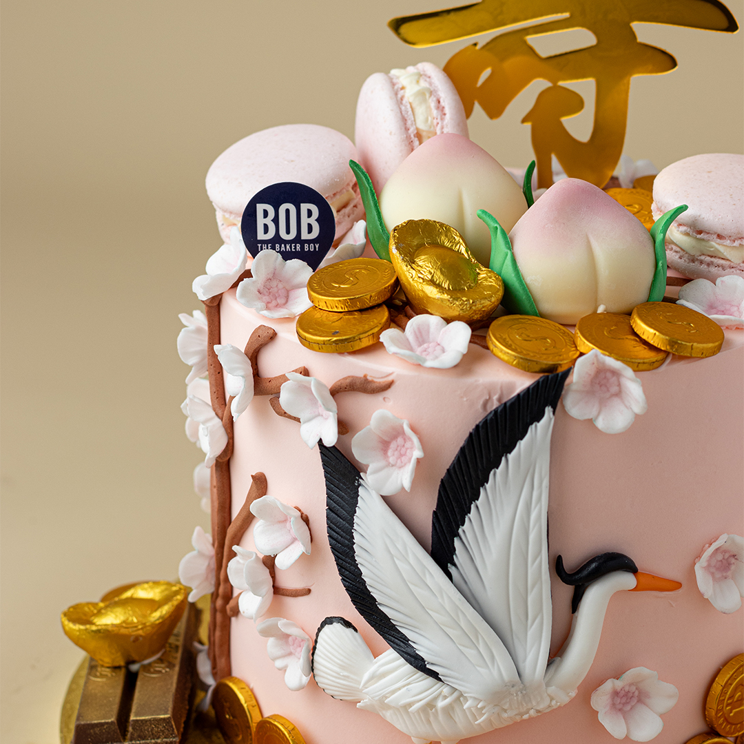 Pastel Pink Longevity Cake with Crane and Shou Tao