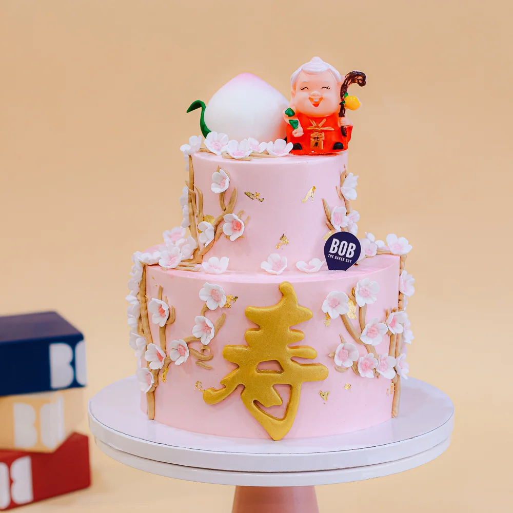 Pastel Pink Longevity Cake with Grandma