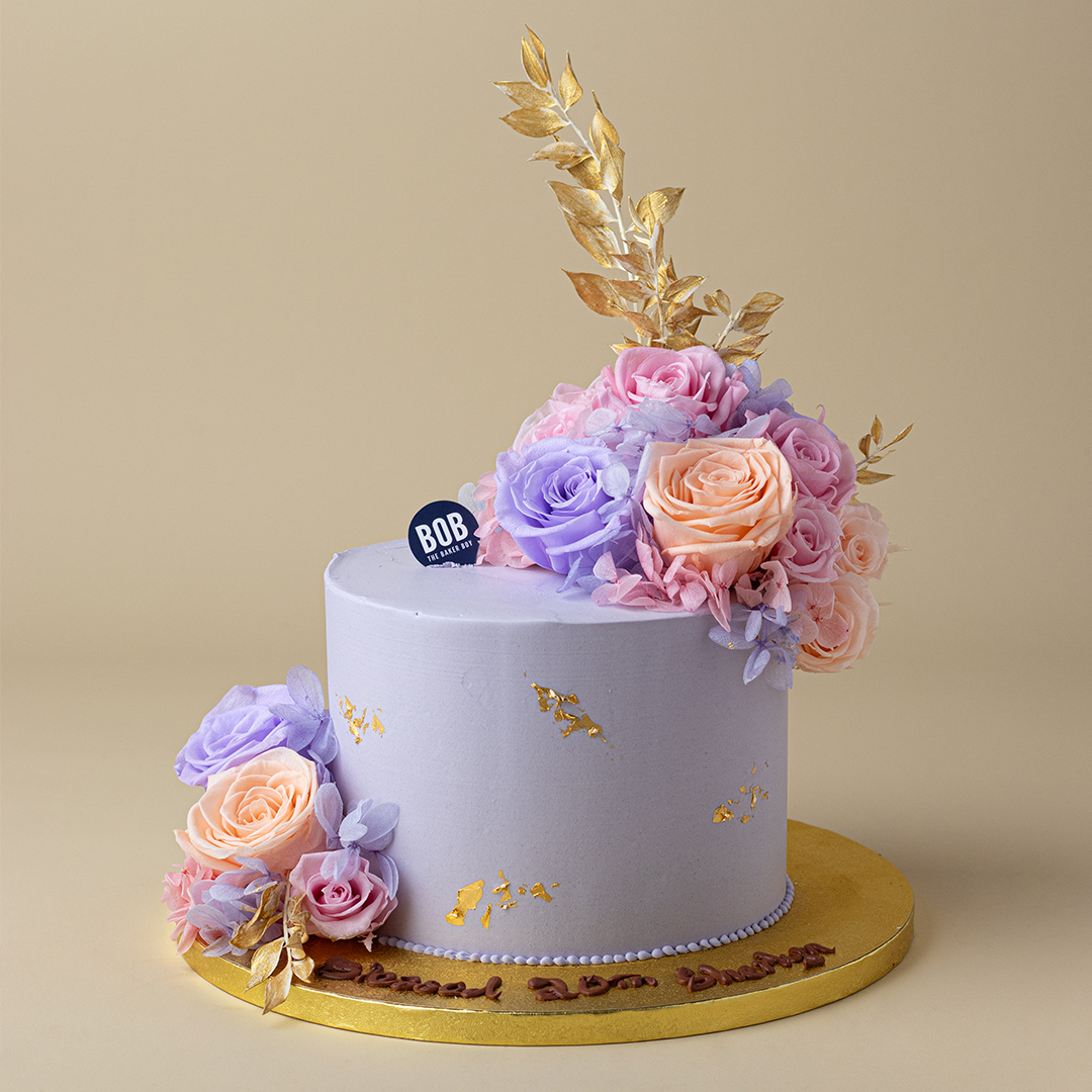 Pastel Purple Floral Cake with Gold Accents