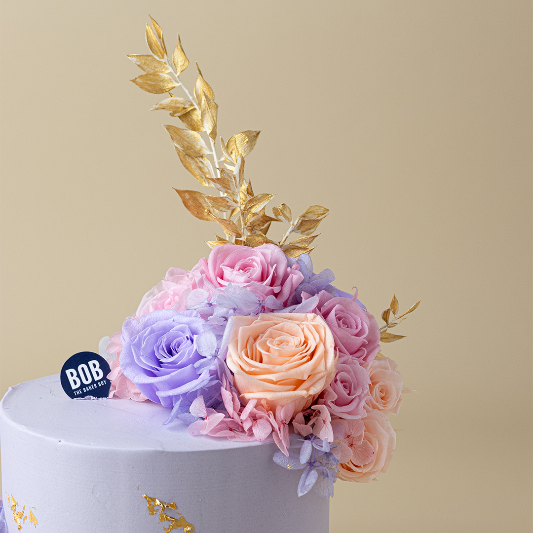 Pastel Purple Floral Cake with Gold Accents