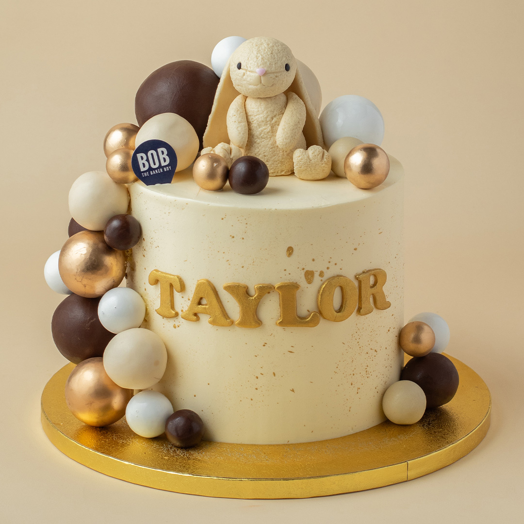 Pastel Yellow Jellycat with Gold Balls Cake