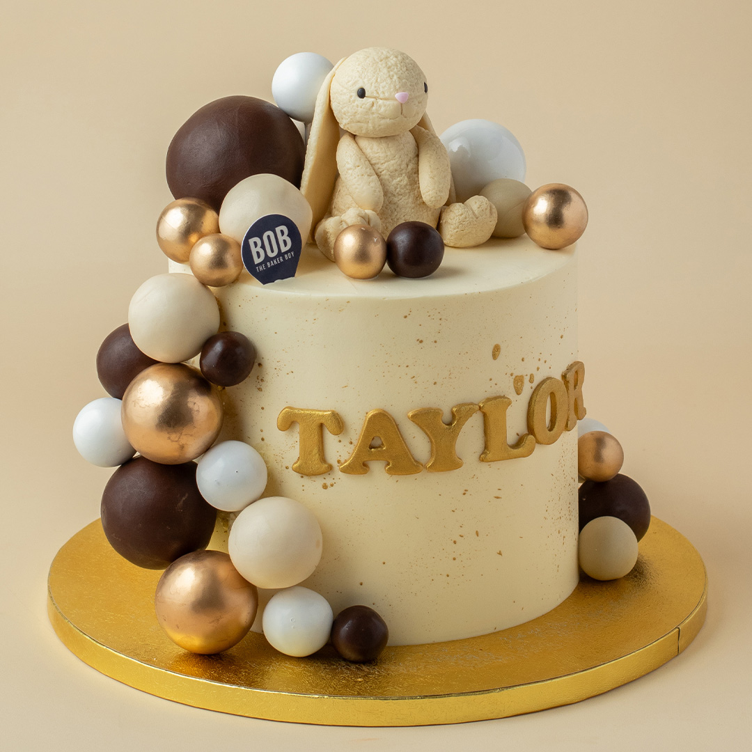 Pastel Yellow Jellycat with Gold Balls Cake