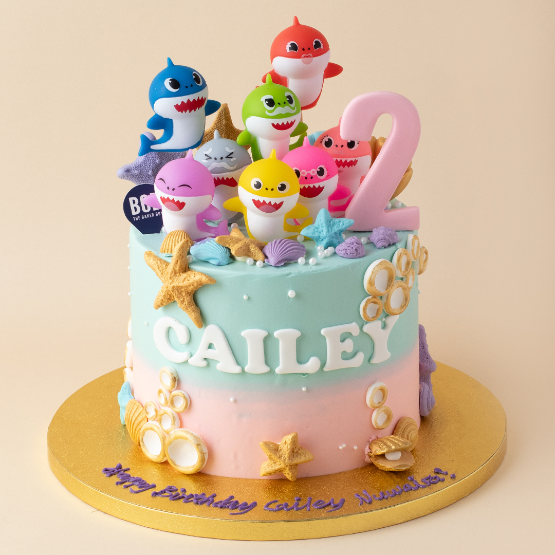 Pink and Blue Ombre Baby Shark Underwater Cake