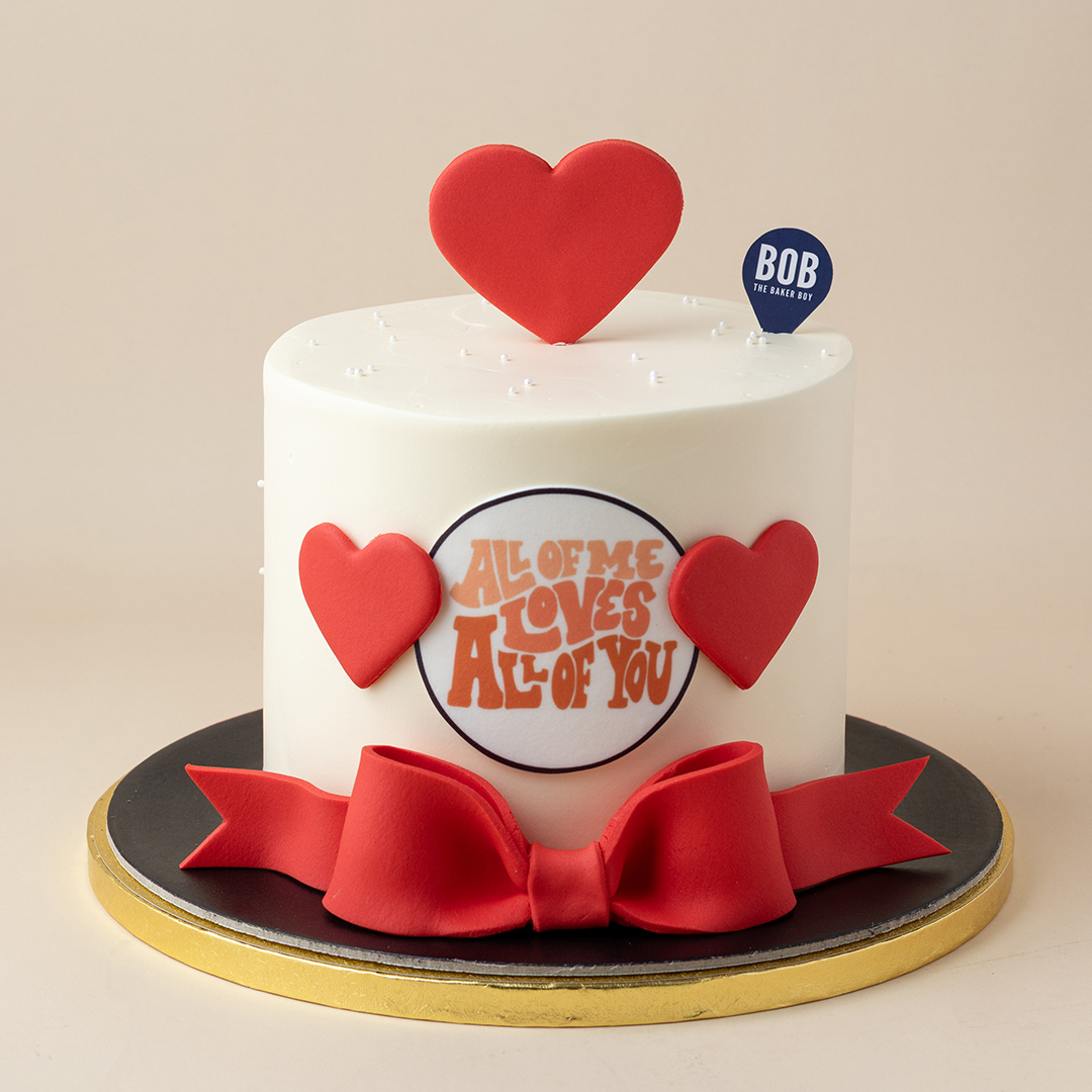 Red Hearts Birthday Cake with Ribbon