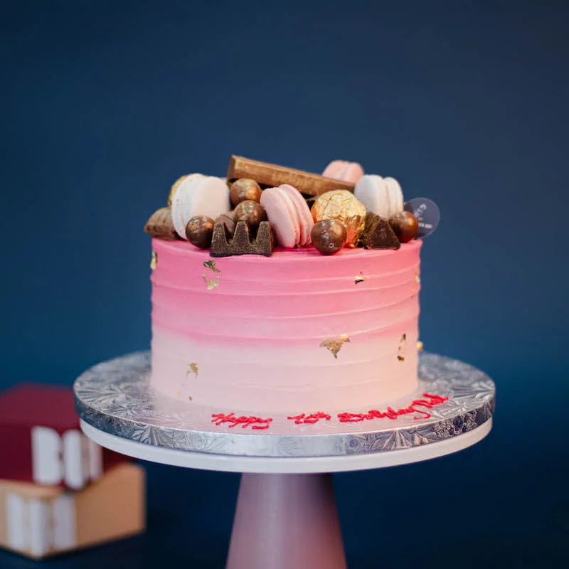 Reverse Pink Ombre Cake with Chocolate and Macarons