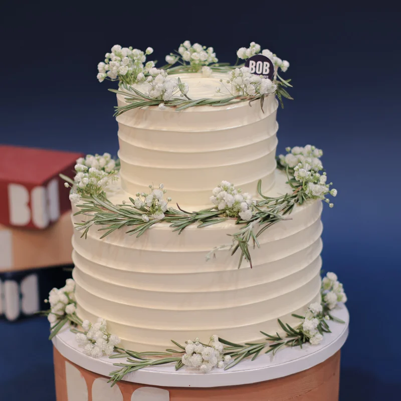 White Swirl Cake with Rosemary and Babies Breath