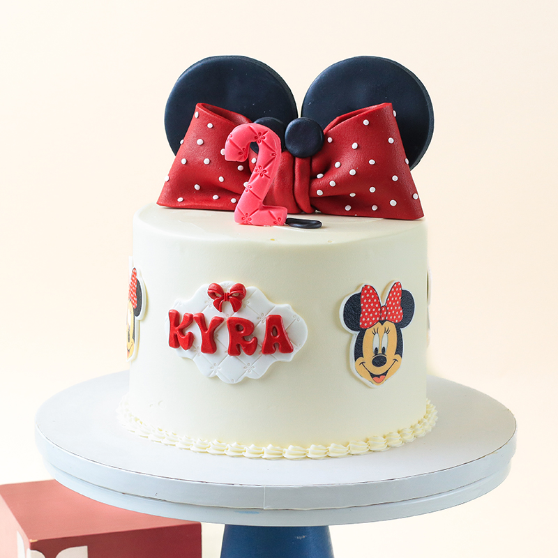 Minnie Mouse Inspired Birthday Cake with Red Ribbon