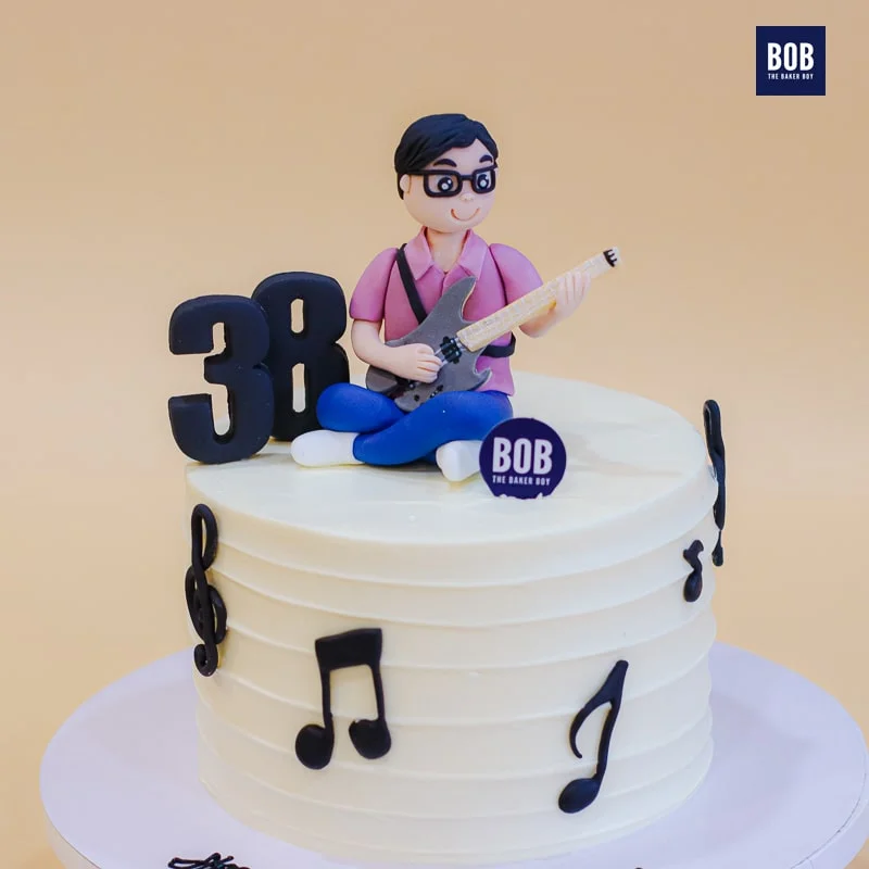 Musician Playing Guitar Cake